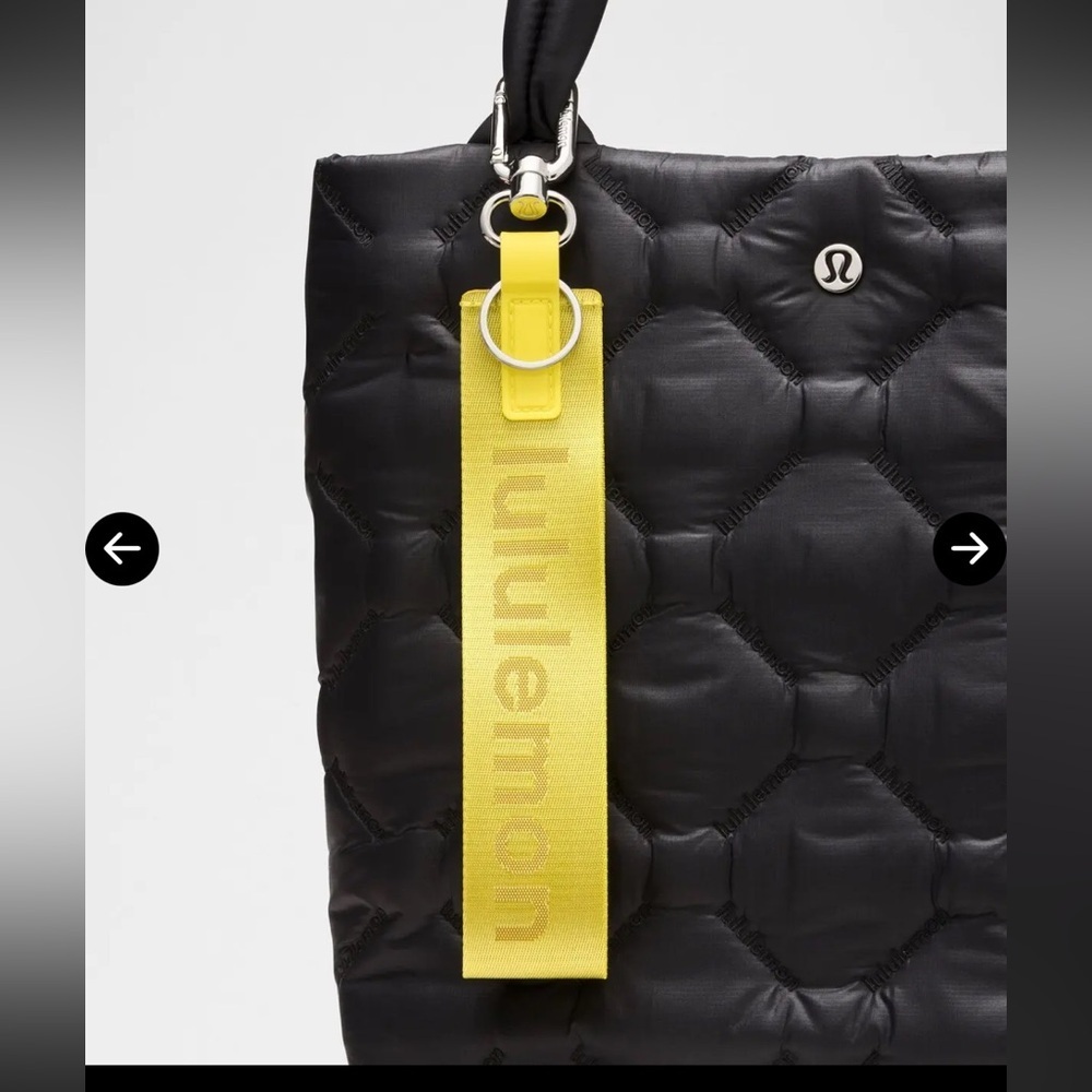 Lululemon Never Lost Keychain Daisy NWT